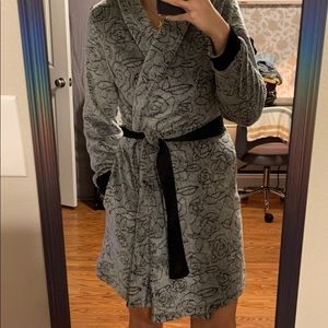 Luxurious grey cozy bathrobe with rose pattern